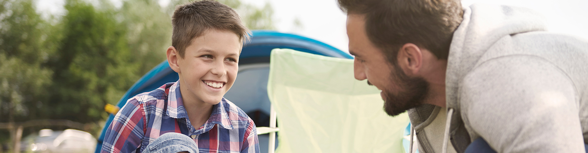 Invisalign Cost - Dad and son camping picture